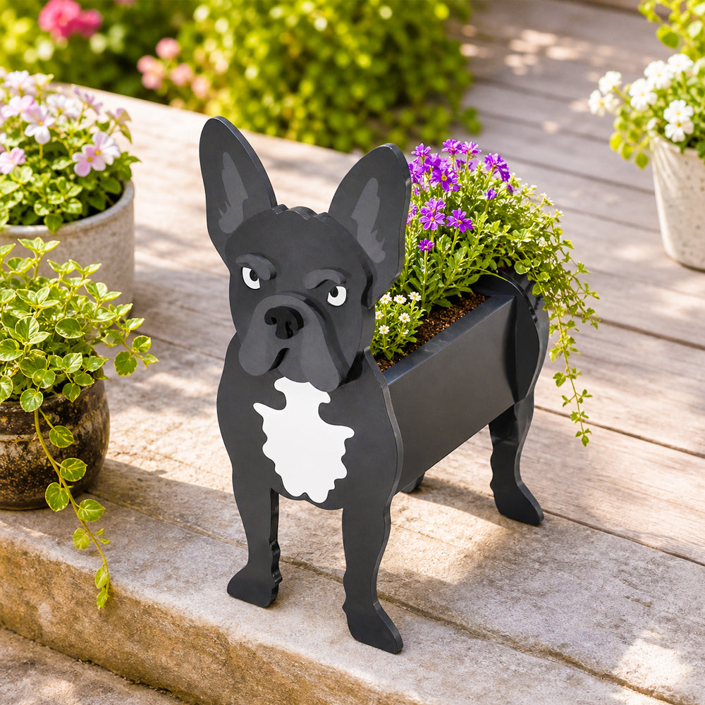French Bulldog planter filled with fresh flowers is placed in the garden.