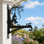 Garden gnome under tree metal hanging basket bracket mounted on outdoor wall for plant decoration