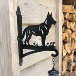German shepherd metal hanging basket bracket mounted on outdoor wall for plant decoration