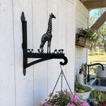 Giraffe metal hanging basket bracket mounted on outdoor wall for plant decoration