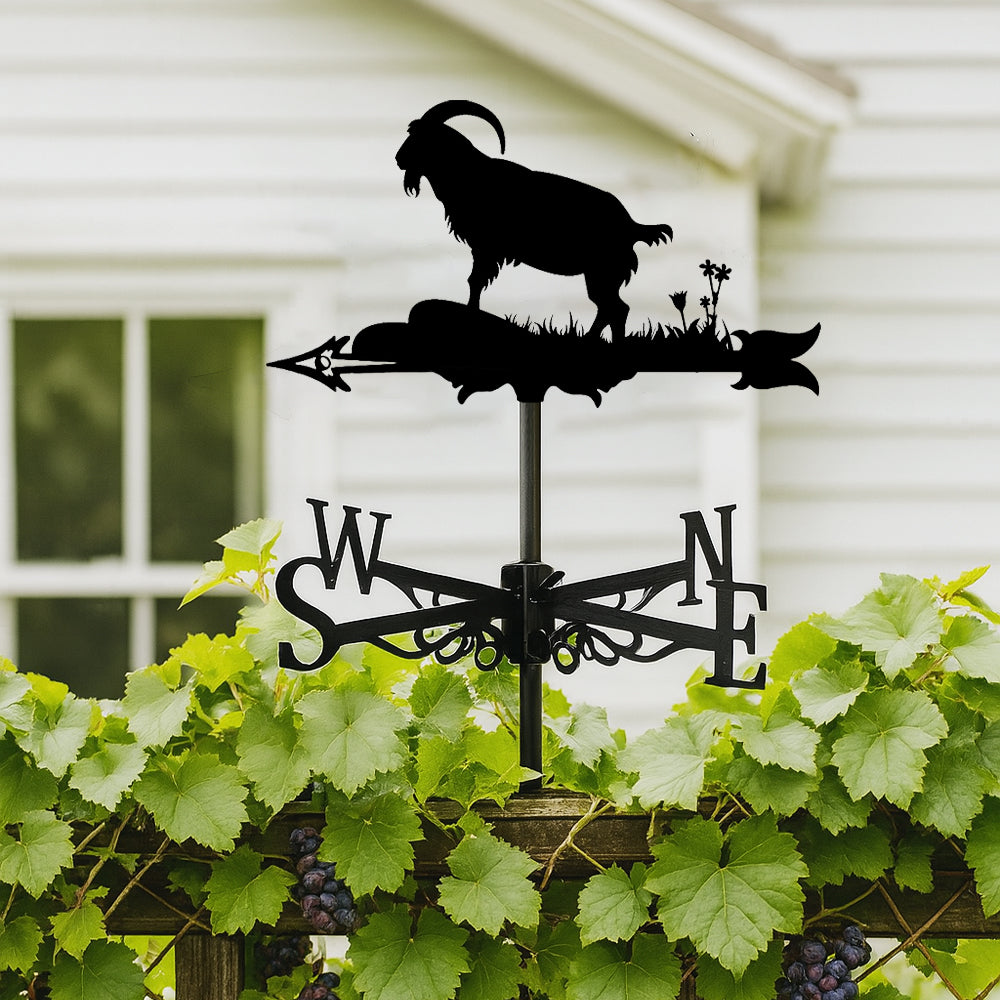 Goat on rock metal weather vane with directional arrows and mounting rod, outdoor roof and garden decoration