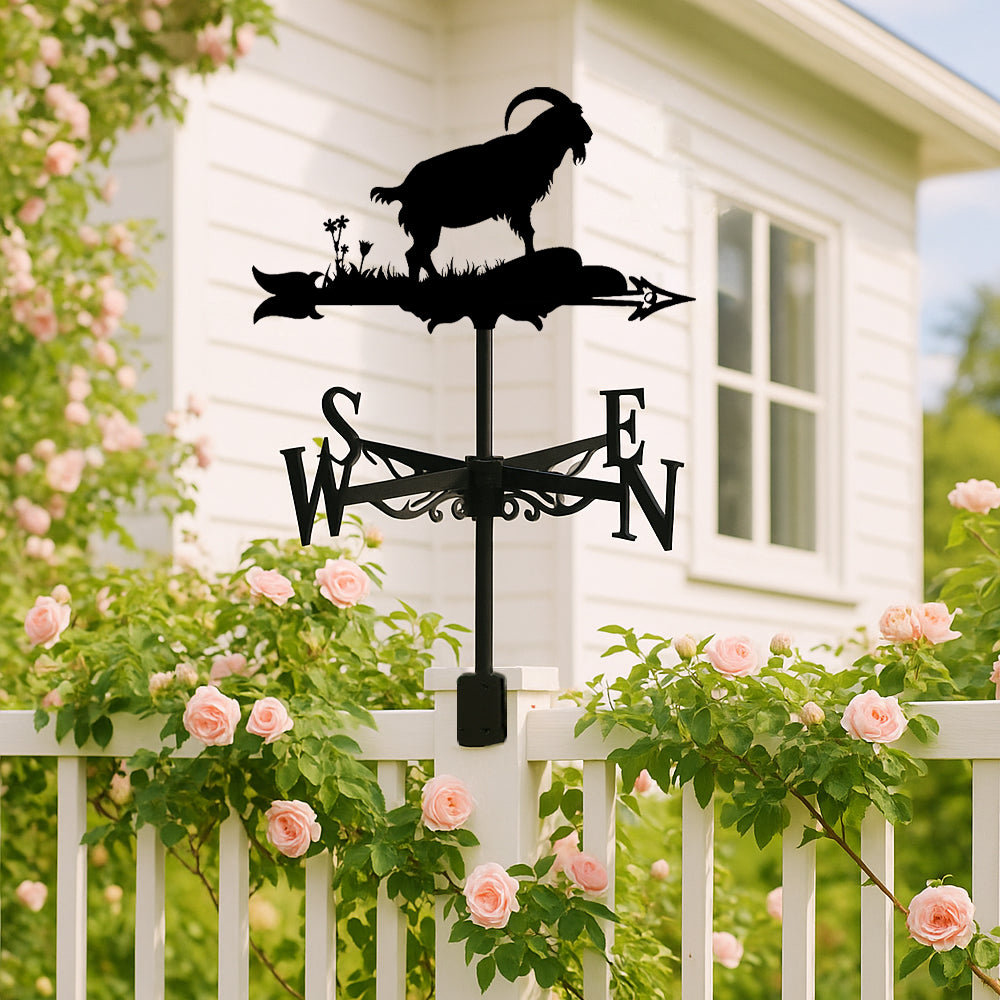 Goat on rock metal weather vane with directional arrows and mounting rod, outdoor roof and garden decoration