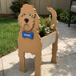 Golden Retriever dog planter filled with fresh flowers is placed in the garden