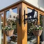 Golden retriever metal hanging basket bracket mounted on outdoor wall for plant decoration