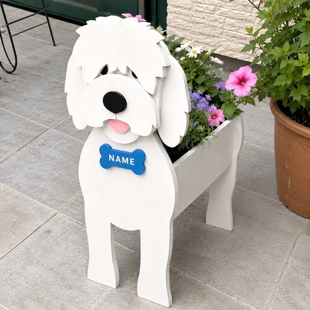 Goldendoodle dog planter filled with fresh flowers is placed in the garden