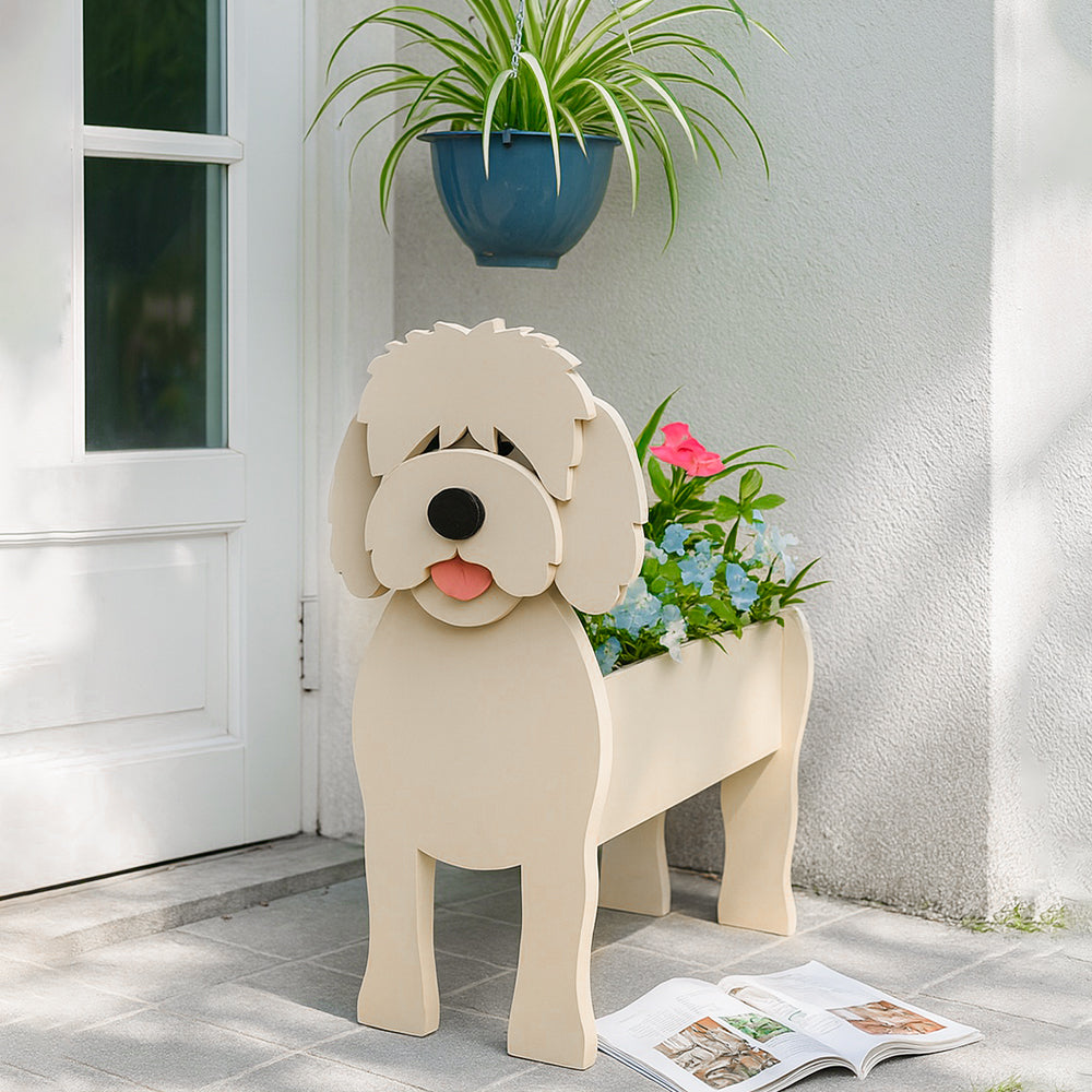 Goldendoodle dog planter filled with fresh flowers is placed in the garden
