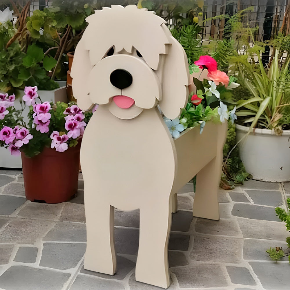 Goldendoodle dog planter filled with fresh flowers is placed in the garden