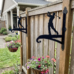 Golf player swinging metal hanging basket bracket mounted on outdoor wall for plant decoration