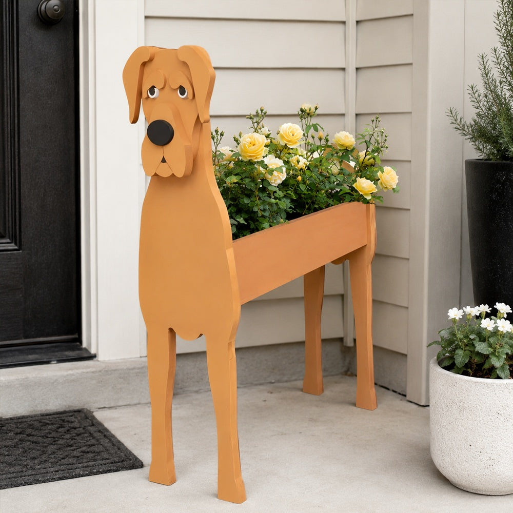 Great Dane dog planter filled with fresh flowers is placed in the garden.