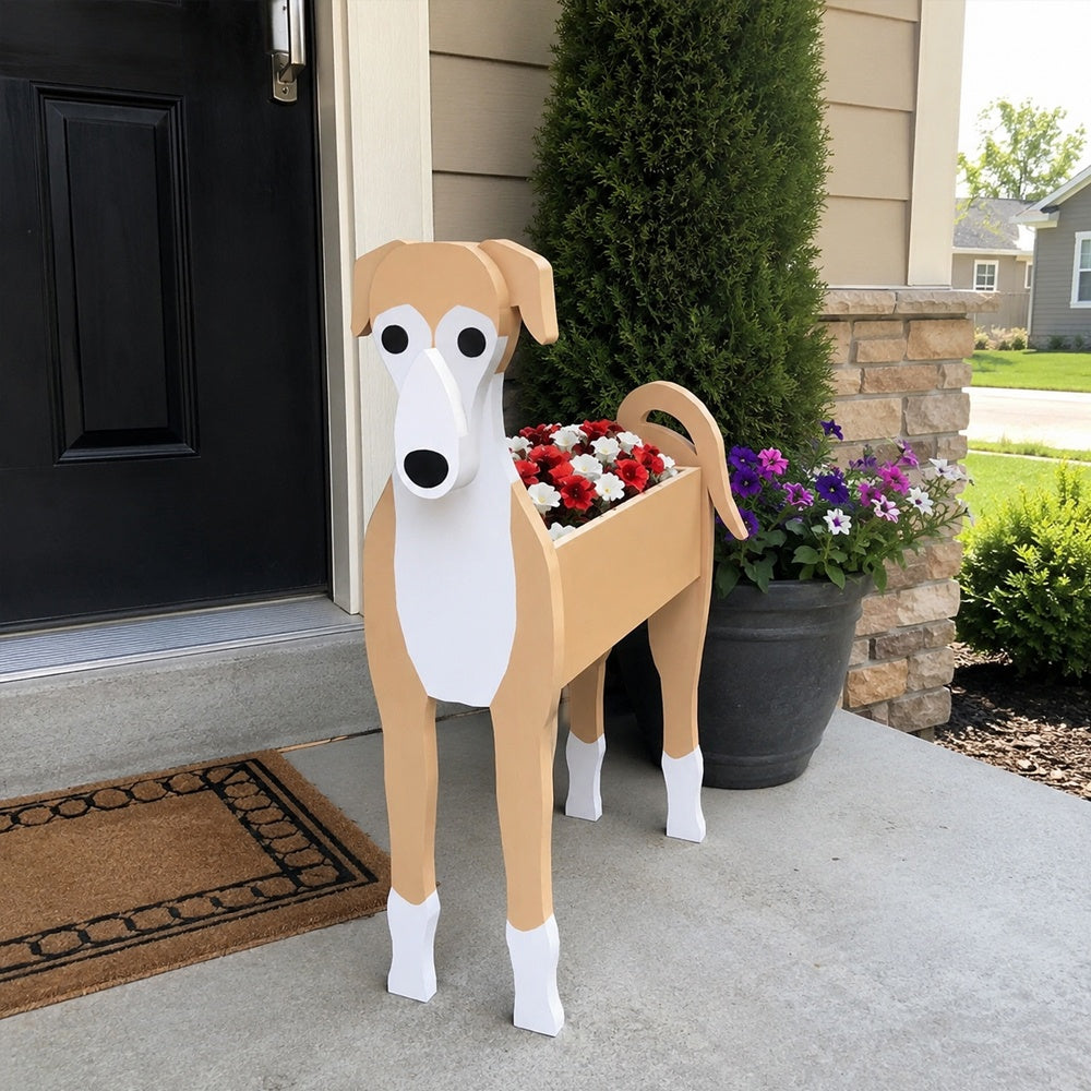 Greyhound dog planter filled with fresh flowers is placed in the garden