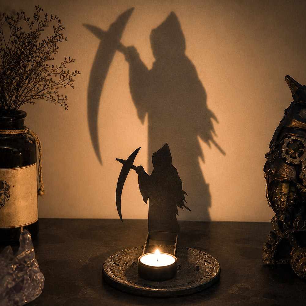 Grim reaper halloween metal candle holder casting a spooky shadow on the wall