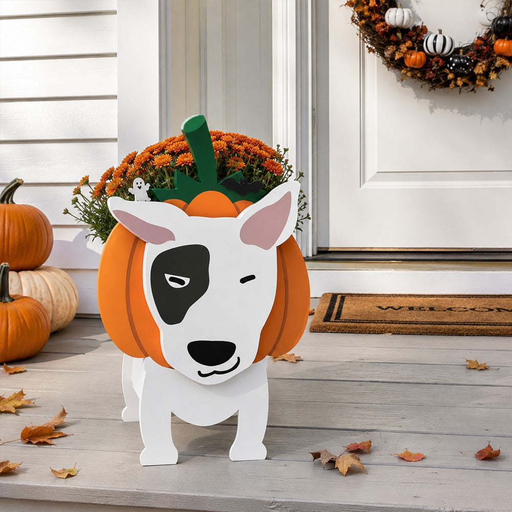Halloween Bull Terrier dog Planter filled with fresh flowers is placed in the garden
