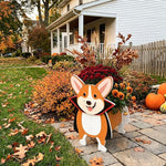 Halloween Corgi dog Planter filled with fresh flowers is placed in the garden