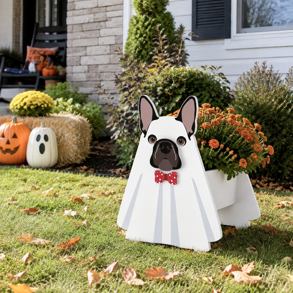 Halloween French Bulldog Planter filled with fresh flowers is placed in the garden