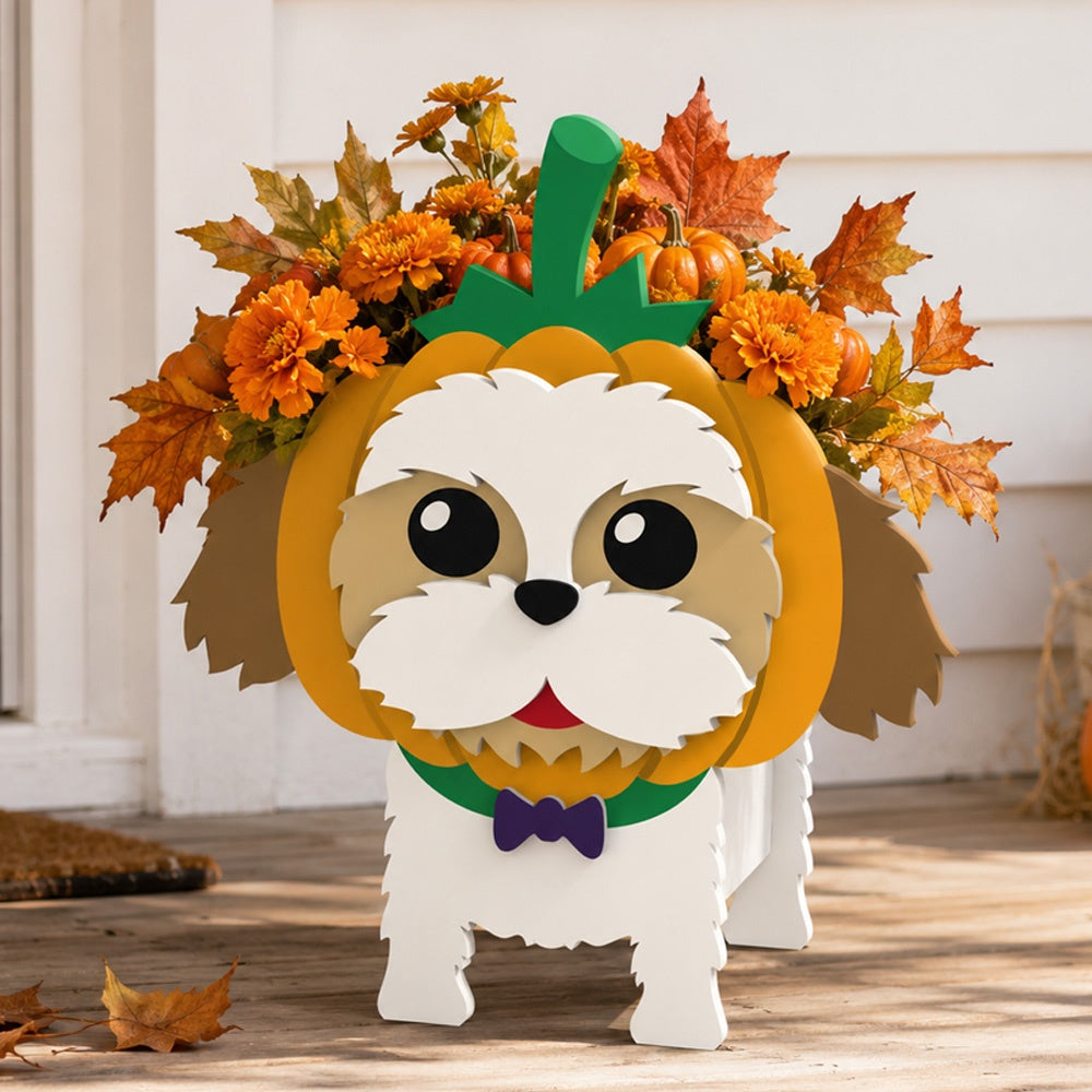 Halloween Shih Tzu Dog Planter filled with fresh flowers is placed in the garden