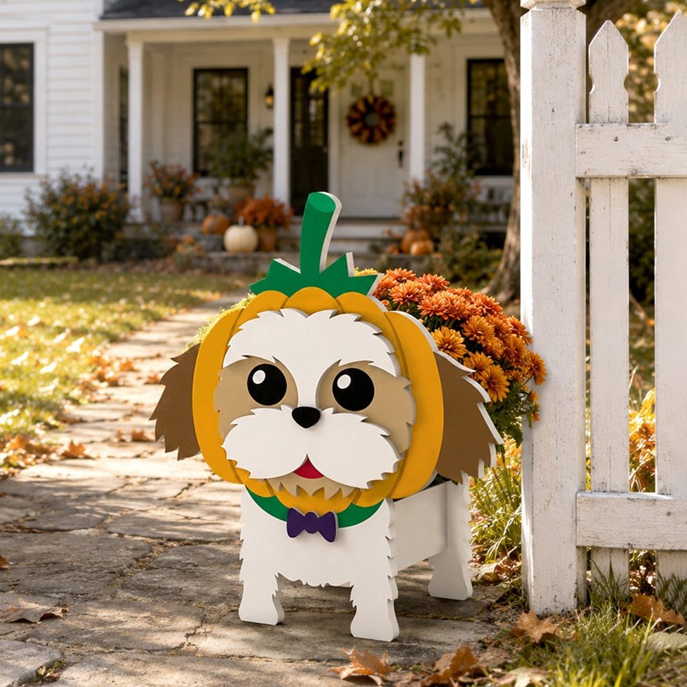 Halloween Shih Tzu Dog Planter filled with fresh flowers is placed in the garden