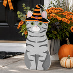 Halloween Silver Tabby Cat Planter filled with fresh flowers is placed in the garden