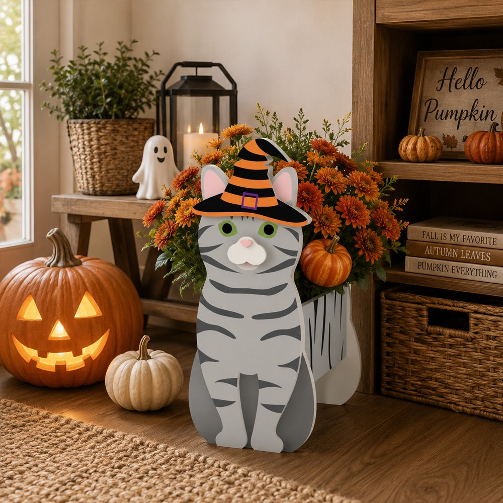 Halloween Silver Tabby Cat Planter filled with fresh flowers is placed in the garden