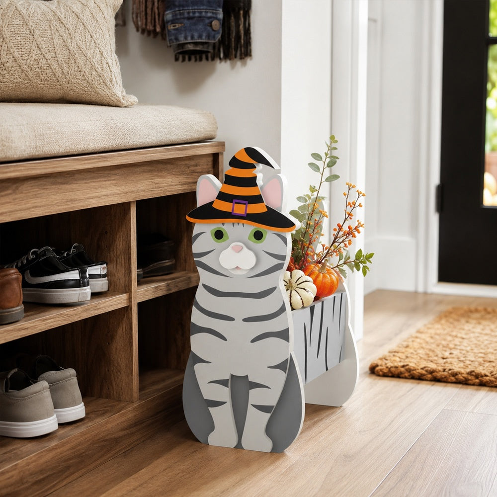 Halloween Silver Tabby Cat Planter filled with fresh flowers is placed in the garden