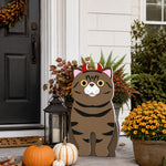 Halloween Tabby Cat Planter filled with fresh flowers is placed in the garden
