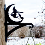 Halloween witch flying on broom metal hanging basket bracket mounted on outdoor wall for plant decoration