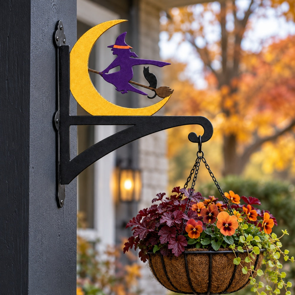 Halloween witch flying on broom metal hanging basket bracket mounted on outdoor wall for plant decoration