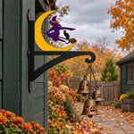 Halloween witch flying on broom metal hanging basket bracket mounted on outdoor wall for plant decoration