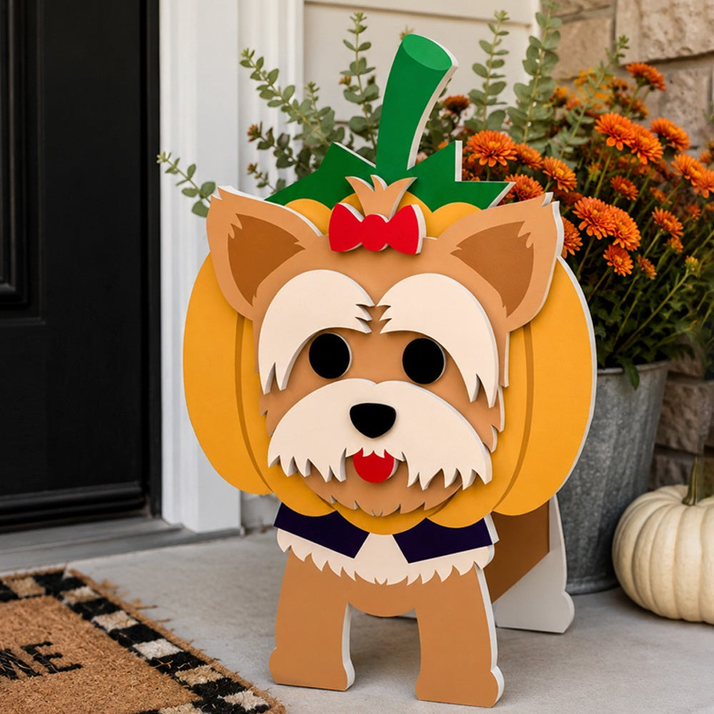Halloween Yorkshire Terrier Dog Planter filled with fresh flowers is placed in the garden