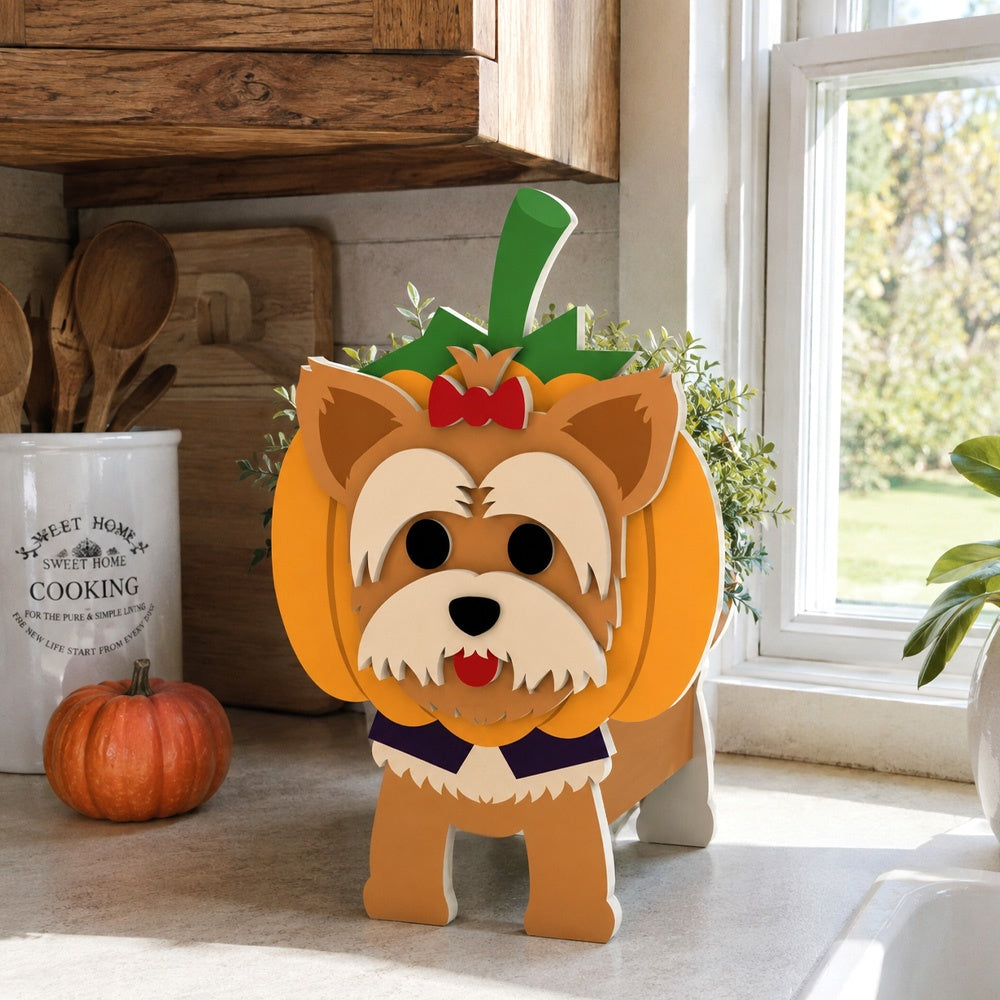 Halloween Yorkshire Terrier Dog Planter filled with fresh flowers is placed in the garden