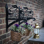 Happy halloween metal hanging basket bracket mounted on outdoor wall for plant decoration