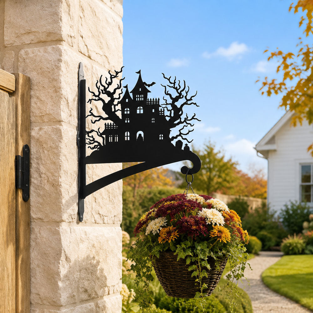 Haunted house metal hanging basket bracket mounted on outdoor wall for plant decoration