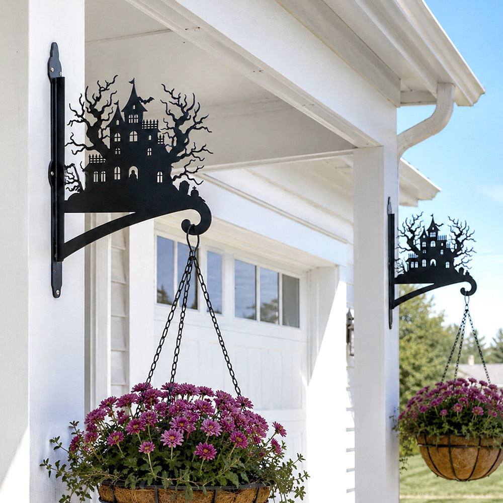 Haunted house metal hanging basket bracket mounted on outdoor wall for plant decoration