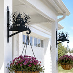 Haunted house metal hanging basket bracket mounted on outdoor wall for plant decoration