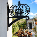 Haunted pumpkin castle metal hanging basket bracket mounted on outdoor wall for plant decoration
