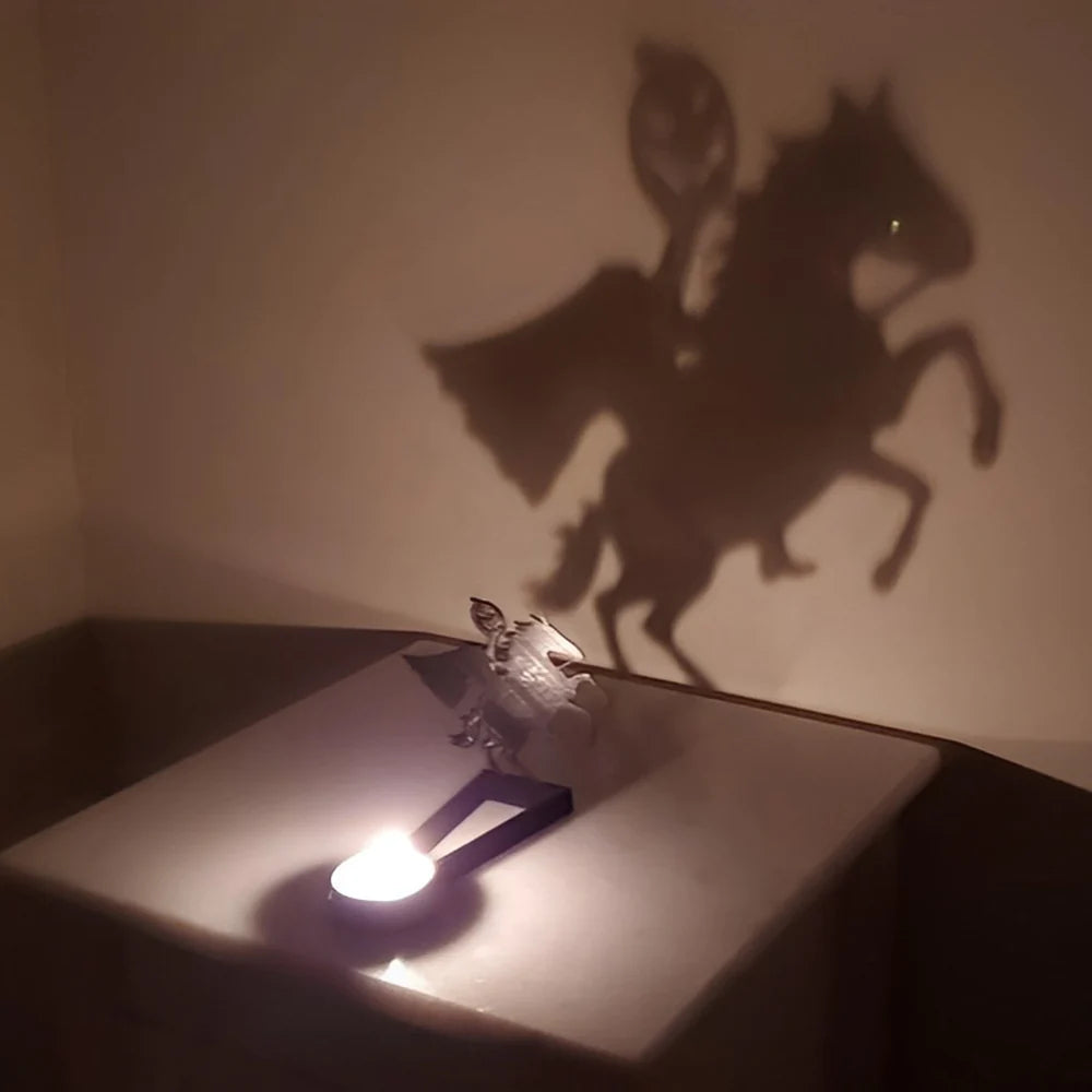 Headless horseman halloween metal candle holder casting a spooky shadow on the wall