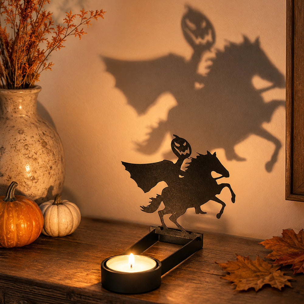 Headless horseman halloween metal candle holder casting a spooky shadow on the wall