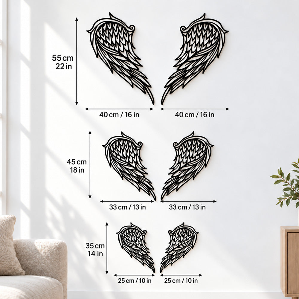 Black metal Heart Angel wings wall art with intricate cutout details displayed on the wall