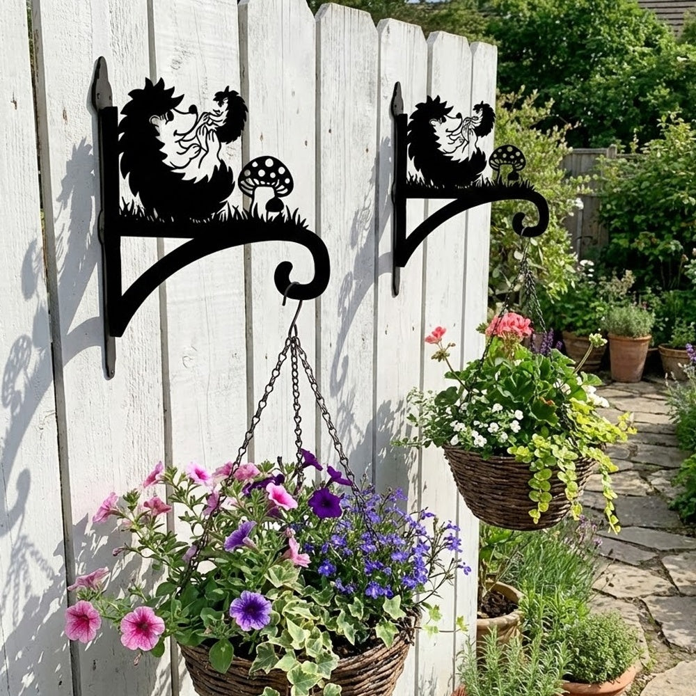 Hedgehogs with mushroom metal hanging basket bracket mounted on outdoor wall for plant decoration