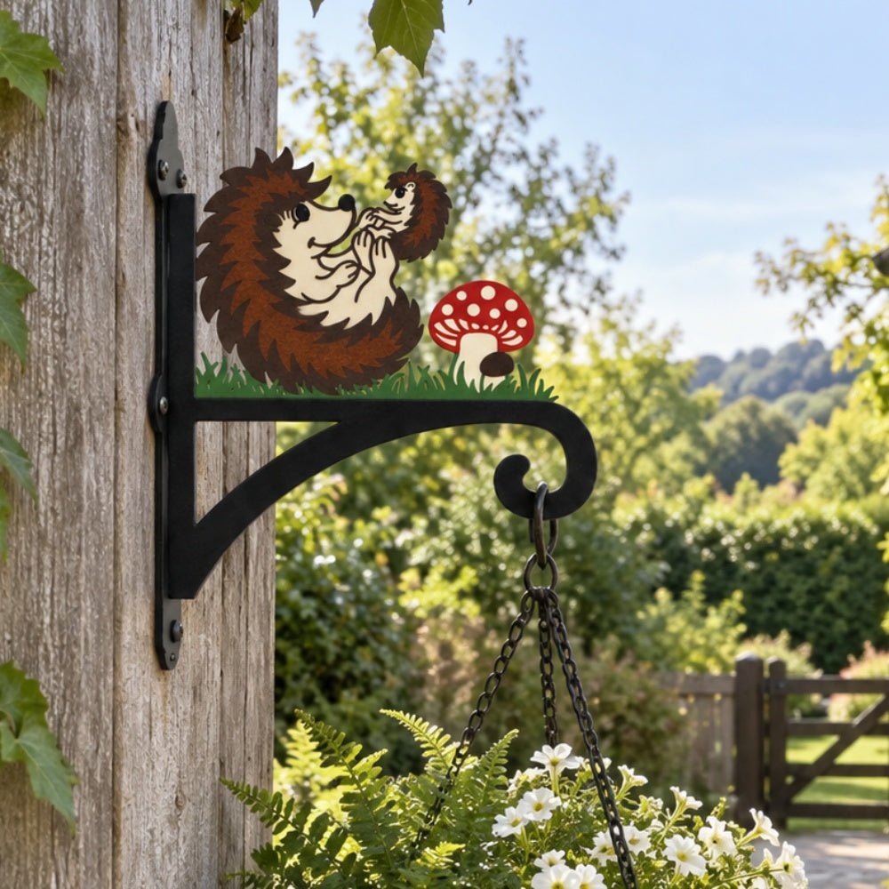 Hedgehogs with mushroom metal hanging basket bracket mounted on outdoor wall for plant decoration