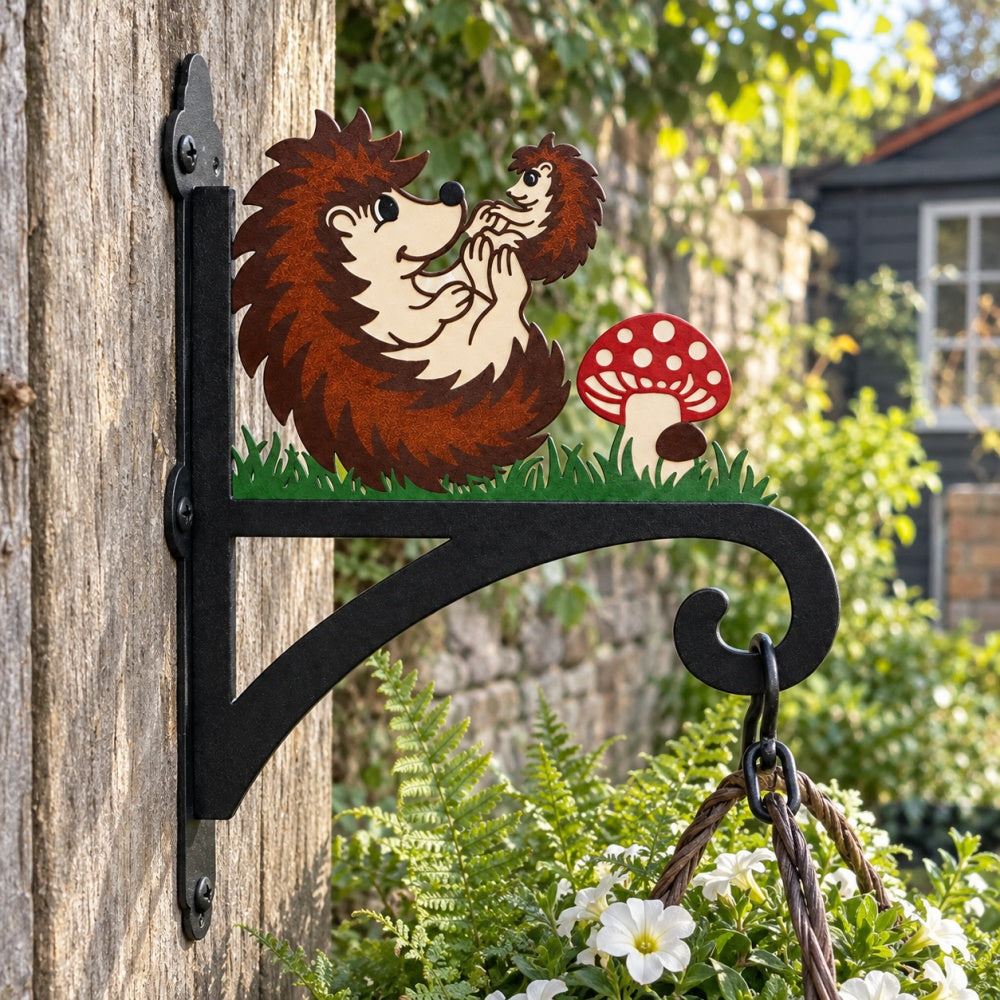 Hedgehogs with mushroom metal hanging basket bracket mounted on outdoor wall for plant decoration