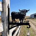 Highland cow silhouette metal hanging basket bracket mounted on outdoor wall for plant decoration