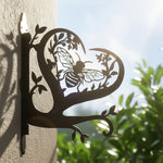 Bee metal hanging basket bracket mounted on outdoor wall for plant decoration