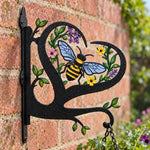 Bee metal hanging basket bracket mounted on outdoor wall for plant decoration