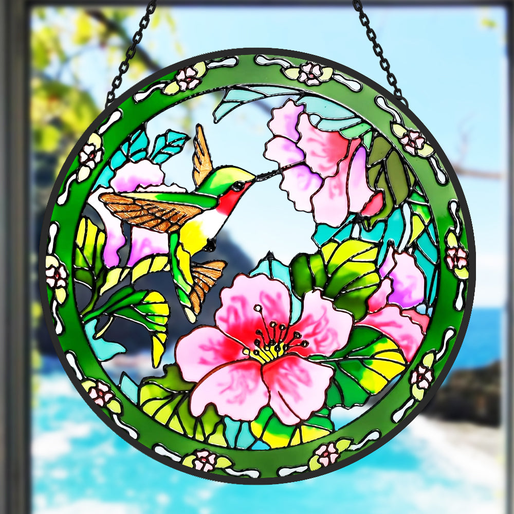 hummingbird feeding on pink blossoms stained glass suncatcher window hanging, suitable for home and garden decoration.