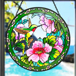 hummingbird feeding on pink blossoms stained glass suncatcher window hanging, suitable for home and garden decoration.
