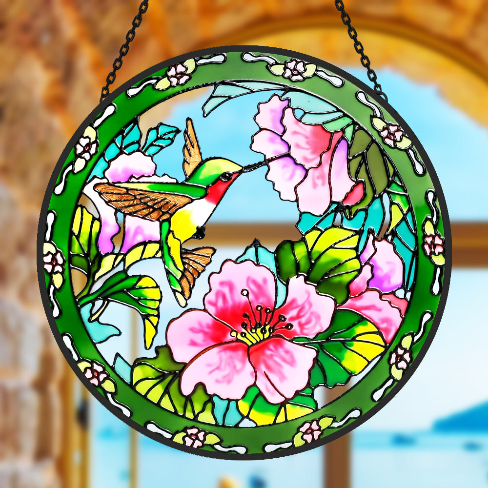 hummingbird feeding on pink blossoms stained glass suncatcher window hanging, suitable for home and garden decoration.