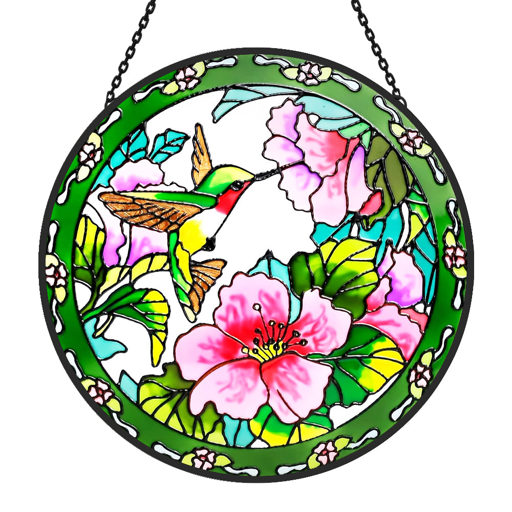 hummingbird feeding on pink blossoms stained glass suncatcher window hanging, suitable for home and garden decoration.