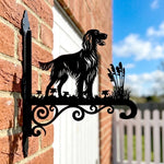 Irish setter metal hanging basket bracket mounted on outdoor wall for plant decoration