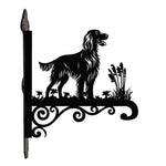 Irish setter metal hanging basket bracket mounted on outdoor wall for plant decoration