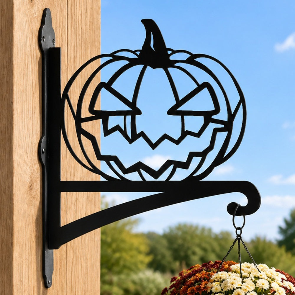 Jack-o’-lantern metal hanging basket bracket mounted on outdoor wall for plant decoration